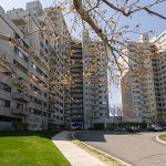 an exterior photograph of the 376 Ocean Avenue condominium building on a bright and sunny day